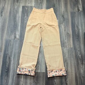 Good Alma tan wide-leg pants w/floral cuffs